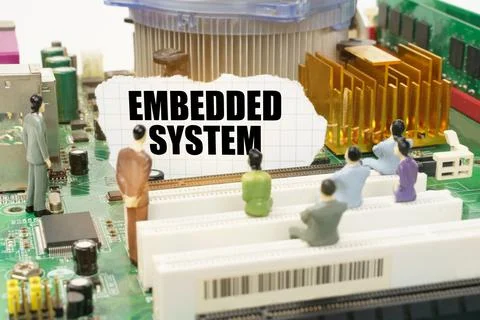 Technology and computer concept. On the motherboard there are figures of peop Stock Photos