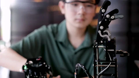 Technology and innovation human being concept, student control robotic seco.. Stock Footage 245063026