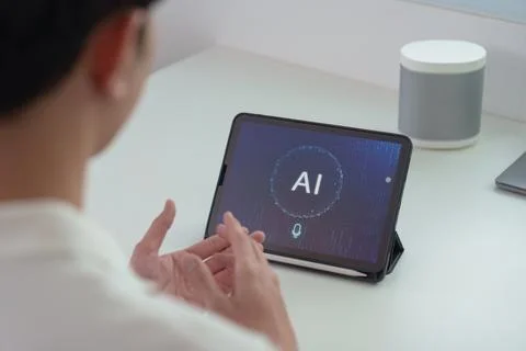 Technology and Lifestyle: User exploring AI features on tablet Stock Photos