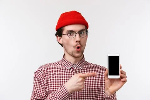 Technology and people concept. Close-up portrait fascinated and impressed good Stock Photos