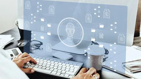 Technology blends human faces with data on a computer screen in an office Stock Photos