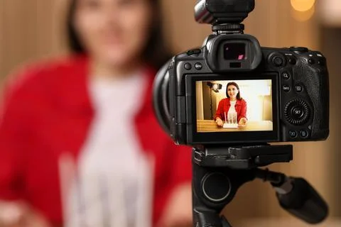 Technology blogger explaining something while recording video at home, focu.. Stock Photos