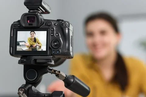 Technology blogger explaining something while recording video at home, focu.. Stock Photos