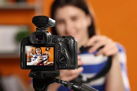 Technology blogger explaining something while recording video at home, focu.. Stock Photos