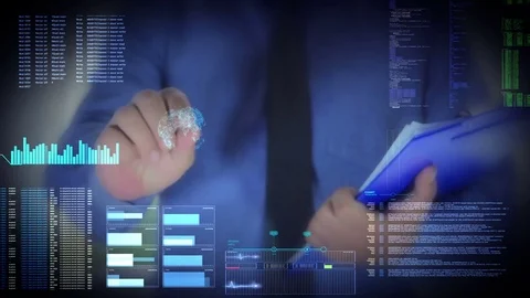 Technology - Businessman works on future technology with huge virtual lcd touch Stock Footage 75829190