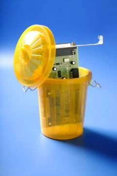 Technology circuit on the trash Stock-Fotos