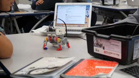 Technology Classroom Student Robot Walking Across Table Stock Footage 126487410