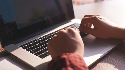 Technology close up of man working with laptop computer and sitting in cafe Stock Footage 87188226