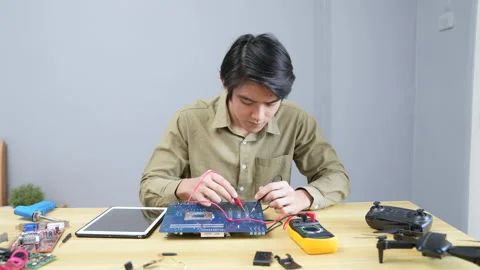 Technology concept of 4k Resolution. Asian man checking the electrical circui Stock Footage 171534834