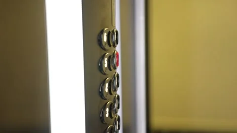 Technology concept. man presses elevator button. hand close up. panel with Video stock 253584651