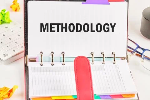 Technology concept. METHODOLOGY written in a business notebook on a free page Stock Photos