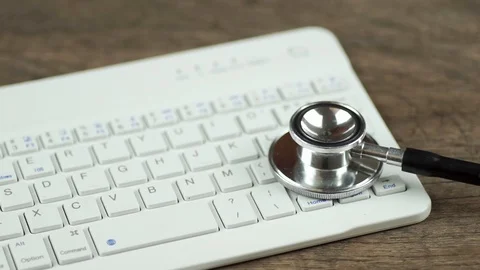Technology conceptual, stethoscope on white keyboard Stock Footage 109425112