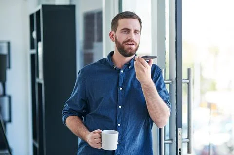 As technology evolves so does the way we communicate. a young businessman having Stock Photos