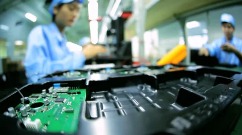 Technology female Chinese worker producing PCBs, China Stock Footage 33528653