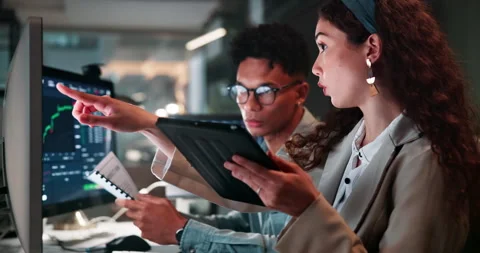 Technology, graphs and business people with discussion in office for investment Stock Footage 283331543