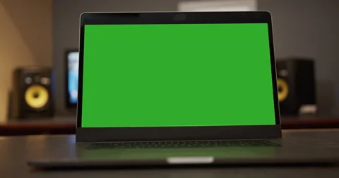 Technology green screen laptop computer video call business office - slow pan Stock Footage 137920906