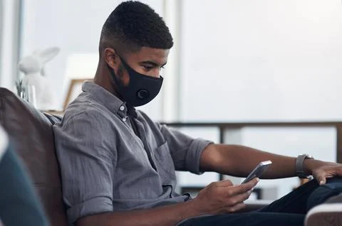 Technology helps with adapting to the changes of business. a young businessman Stock Photos