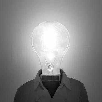 Technology innovation concept, light bulb man with bright idea Stock Photos