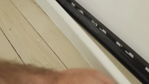 Technology of installation and installation of plastic floor plinth 動画素材 147172570