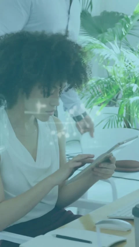 Technology interface animation over woman using tablet in bright office space Stock Footage 344403850