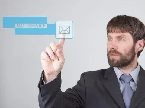Technology, internet and networking concept - Businessman presses mail service Stock Photos