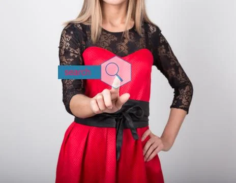 Technology, internet and networking concept. beautiful woman in a red dress with Stock Photos