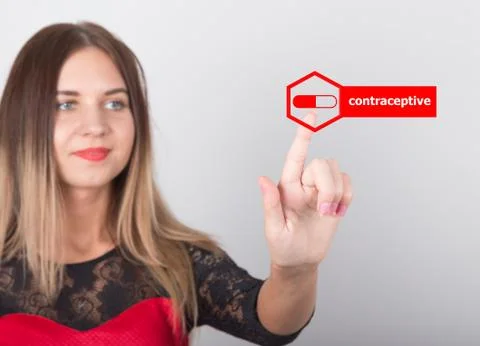 Technology, internet and networking concept. beautiful woman in a red dress with Fotos de archivo