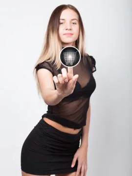 Technology, internet and networking concept. beautiful woman in a short black Stock Photos