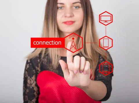 Technology, internet and networking concept. beautiful woman in a red dress with Stock Photos