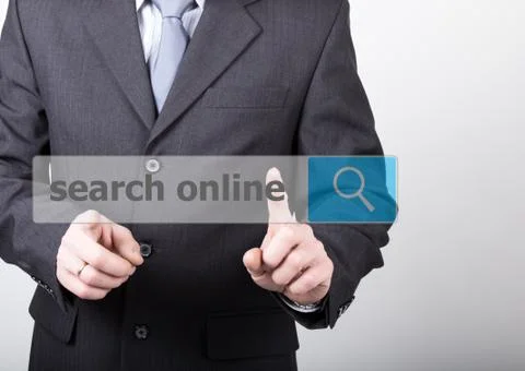 Technology, internet and networking concept - Businessman presses search online Stock Photos