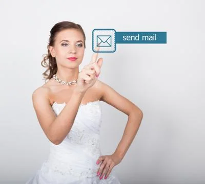 Technology, internet and networking concept. Beautiful bride in fashion wedding Foto stock