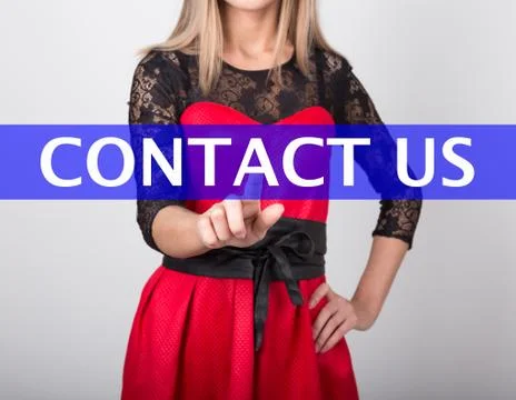 Technology, internet and networking concept. beautiful woman in a red dress with Stock Photos