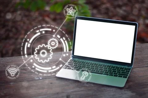 Technology laptops pair nature and sustainable business with security. Stock Photos