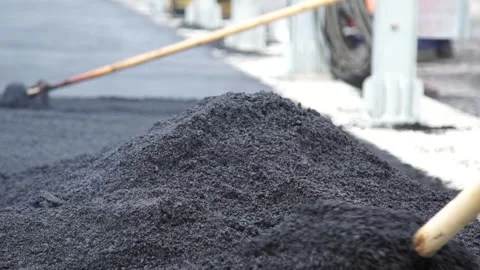 Technology for laying bitumen mixture, road repair Stock Footage 276969071