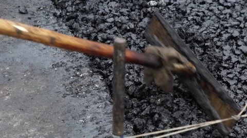 Technology for laying bitumen mixture, road repair Stock Footage 276969195