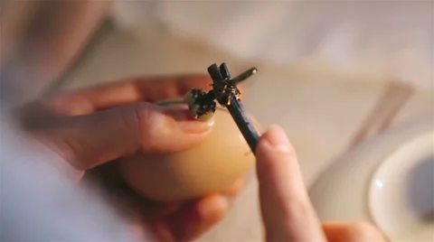 Technology of painting on Easter egg . Video stock 61845635