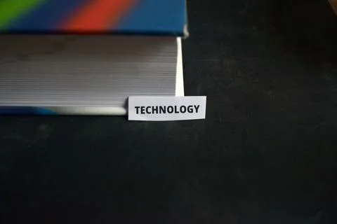 Technology Paper Tab Inserted in Book Pages Symbolizing Modern Advancement Stock-Fotos