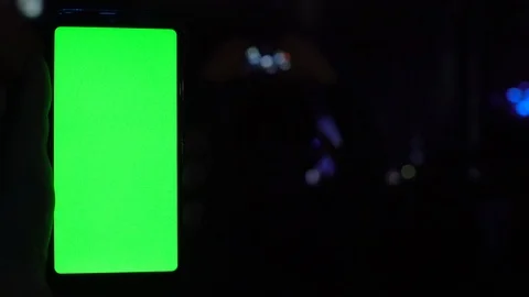 Technology party concept hand holding cell phone mobile smartphone with Stock Footage 118134620