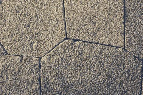 The technology of polygonal masonry at the base of an ancient structure. Stock Photos