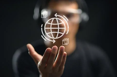 Technology Professional Demonstrating Global Networking Concept with Hand G.. Stock Photos