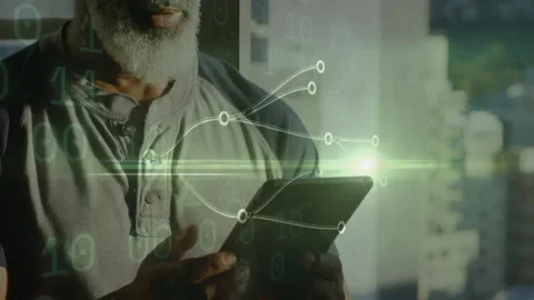 Technology professional tapping tablet screen and activating glowing nodes while Stock Footage 312407915