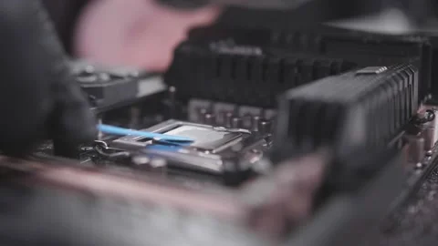 Technology of replacing thermo paste on the CPU close shot Stock Footage 154647980