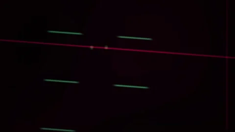 Technology Screen Display with Dynamic Tilting Red and Green Lines on Black.. Stock Footage 343770345