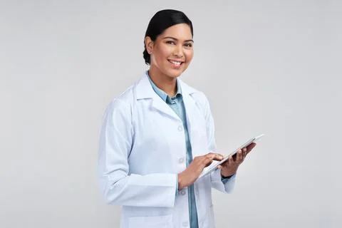 Technology simplifies science. Cropped portrait of an attractive young female Stock Photos