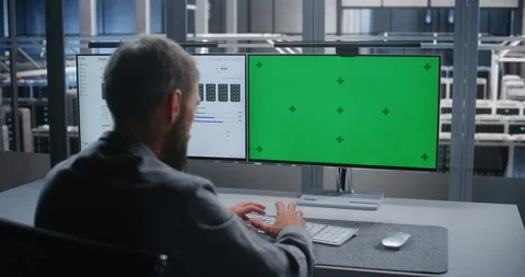 Technology Specialist Using Replaceable Screen for Network Administration Stock Footage 344963788