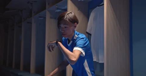 Technology for sport and active living. Soccer or football player man talking Stock Footage 141664048