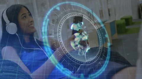 Technology student in library lifting smartphone and browsing holographic UI for Stock Footage 318239528
