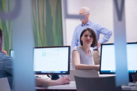 Technology students group in computer lab school  classroom 写真素材