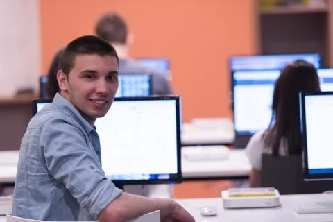 Technology students group in computer lab school  classroom Foto stock