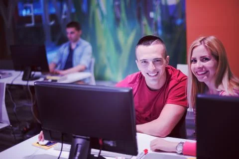 Technology students group in computer lab school  classroom Foto stock